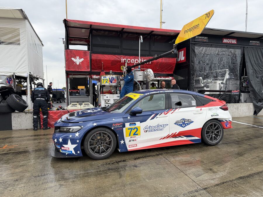TCR car in a wet paddock on race morning